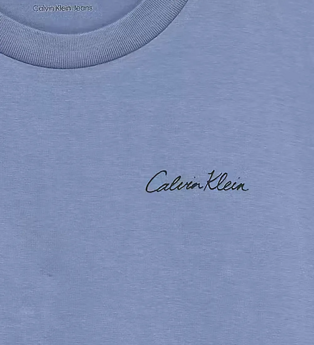 Børn Calvin Klein T-Shirts>T-shirt - Polaroid - Satin Blue