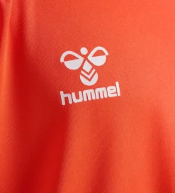 Børn Hummel Træningssæt|Træning Og Gymnastik></noscript>Træningssæt - HmlLogo - Nasturtium/Dark Denim