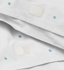 Juna Sengetøj>Sengetøj - Daisy - Baby - Hvid/ Lyseblå